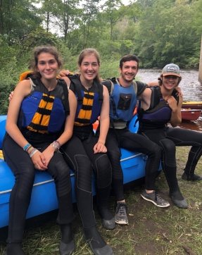 Quest staff members on a rafting trip.