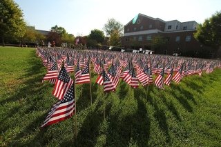 A field filled with flags. 