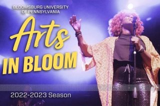 A girl on stage: Arts in Bloom. 