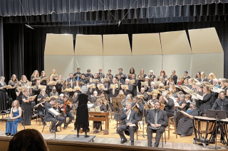 The chorus on stage. 