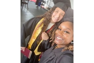 Two girls on graduation day. 