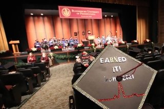 An auditorium filled with people. 