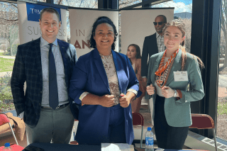 Scott Hess '07 (left) represents Tom James on campus recently to speak with students about potential careers. Also pictured far right is Jennifer Monser ’19.