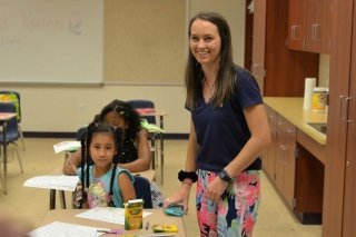 Molly McCafferty '18 works with a student in the Migrant Education Program