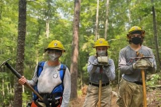 Amanda Settembrino (left) is serving with the AmeriCorps fighting fires.