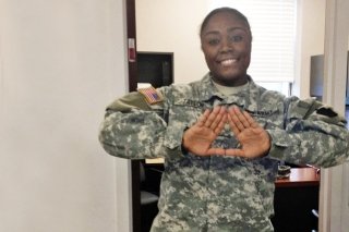 A woman in a military outfit.