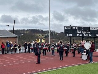 Marching band on the track. 