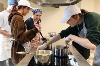 Students cooking. 