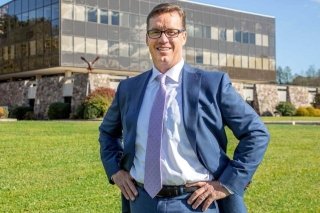 Dan Klingerman outside the headquarters of The Liberty Group.