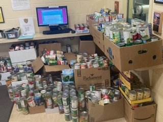 Boxes of cans of various foods.