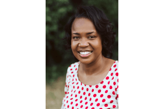 A headshot of a woman. 