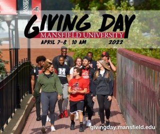 A group of students walking on campus. 