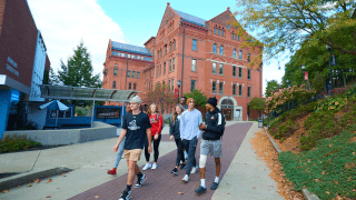 Students walking on campus. 