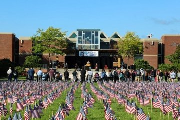 A field filled with flags. 