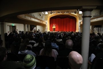 Theatre pictured with a crowd. 
