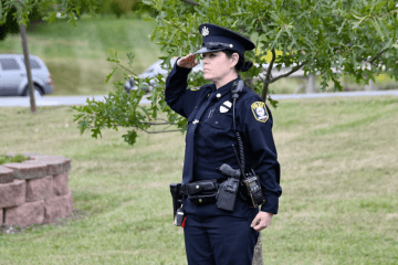 A officer saluting. 