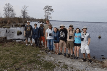 A group of people standing together. 