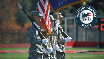 Military men holding flags. 