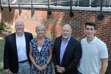 •	Shown from left are members of the Jones family: Tom Jones, Sue Sparhawk, Steve Jones, and Alex Jones.