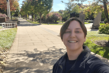 Brittney Hartzell takes a selfie on the quad of the Bloomsburg Campus