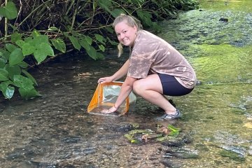 Student Collecting Water Sample