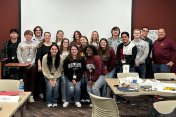 a group of students from the inaugural Bent Leadership program pose for a photo