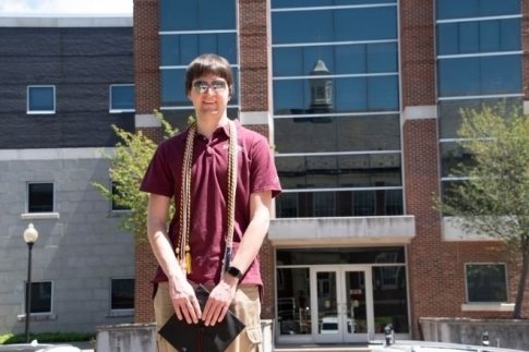 Schyler Kelsch on the steps of Ben Franklin Hall