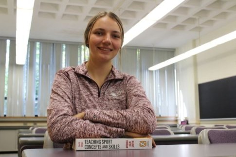 Health and Physical Education student sitting at a desk