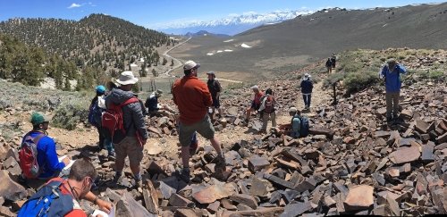 Professors and students from Commonwealth University explore the landscape and snow-capped mountains.