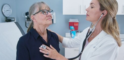 Doctor using stethoscope