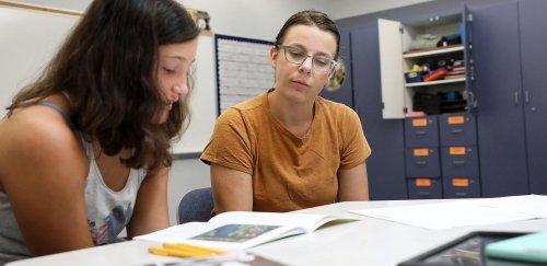 a school counselor working with a teenager
