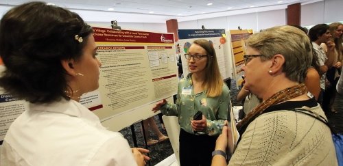 Commonwealth University - Bloomsburg student presenting research at campus event.