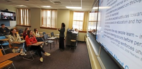 ESL Certificate program professor and students in classroom