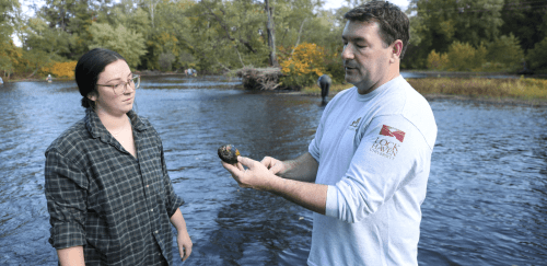 Watershed program student in field