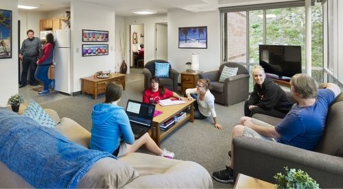 Students talking in common area of residence hall at CU-Mansfield