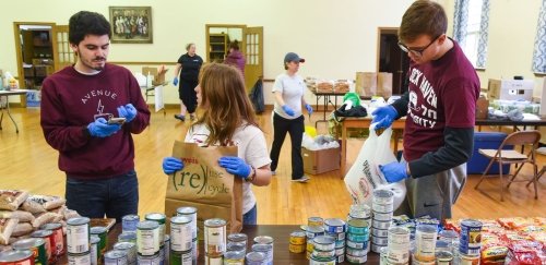 Commonwealth University Campus Cupboard food pantry students bag non-perishable items for Bloomsburg, Lock Haven, and Mansfield