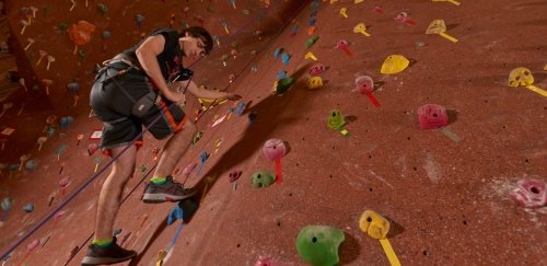 Student climbs on rock wall at Commonwealth University-Mansfield, formerly Mansfield University, Kelchner Fitness Center