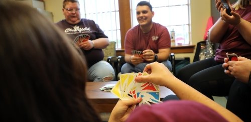 Students gather for a fun game of Uno in between classes at Commonwealth University-Clearfield, formerly Lock Haven University-Clearfield.