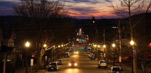 Traffic flows at night toward the campus of Commonwealth University-Bloomsburg, formerly Bloomsburg University.