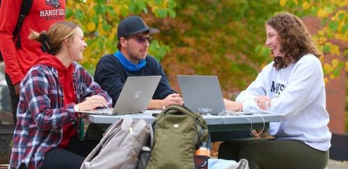 Commonwealth University-Mansfield, formerly Mansfield University, students take online classes with laptops