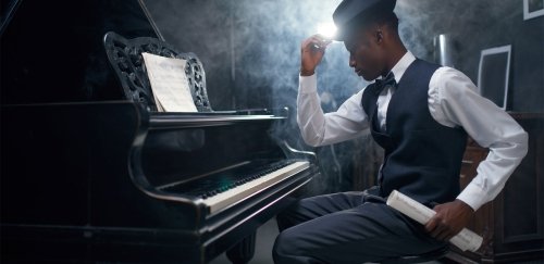 Ebony grand piano player and jazz musician