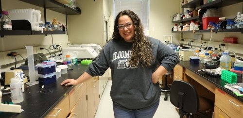 MS Biology student standing in a lab