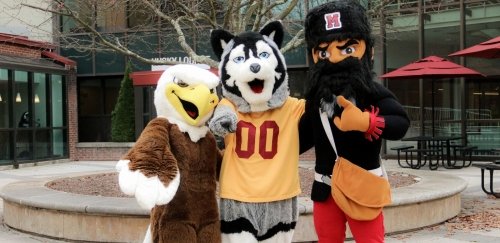 Husky, Bald Eagle, and Mountie mascots