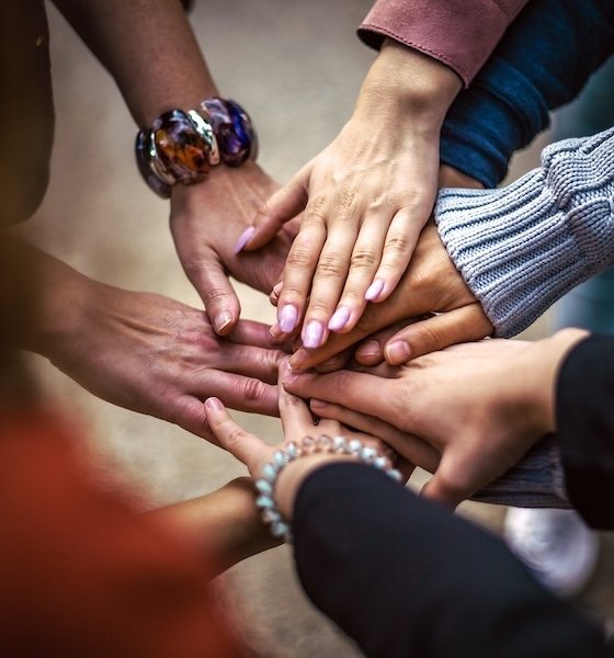 Hands in huddle