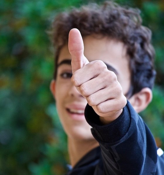 Boy giving thumbs-up