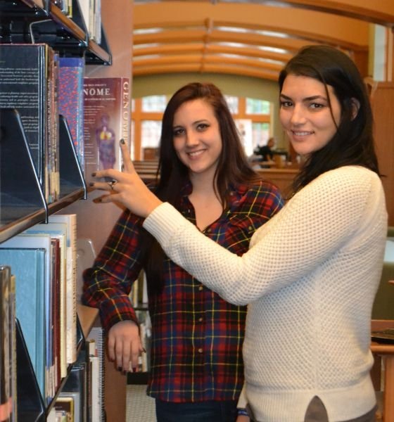 Commonwealth University-Clearfield, formerly LHU Clearfield Campus, students with textbooks in the campus library