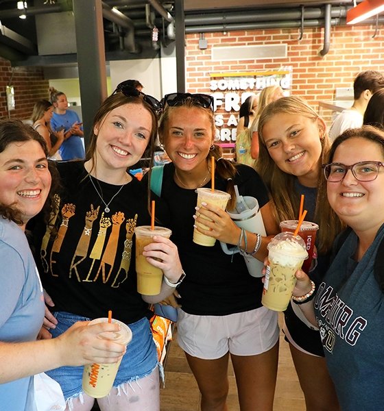 Friends make a quick Dunkin Donuts stop in between classes at Commonwealth University-Bloomsburg, formerly Bloomsburg University