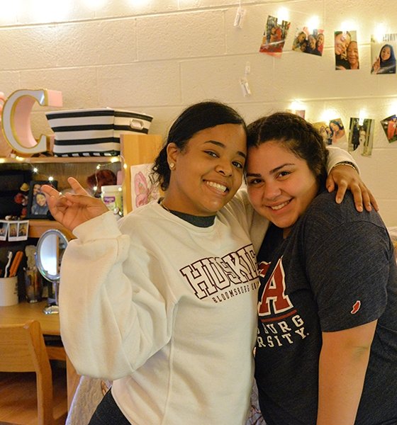 Roommates hang out in their dorm at Commonwealth University-Bloomsburg, formerly Bloomsburg University.