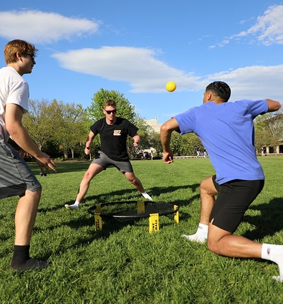 Friends enjoy a game of spike ball on the Quad at Commonwealth University-Bloomsburg, formerly Bloomsburg University.