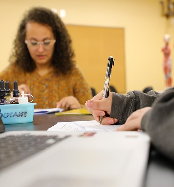 Health science students take notes during a botany lecture at Commonwealth University-Clearfield, formerly Lock Haven University at Clearfield. 